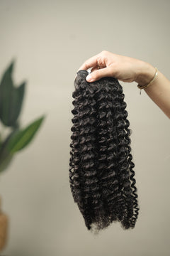 D'HAIR Aria Ringlet Curl 20-inch weft. Slender, individually defined corkscrew ringlets.